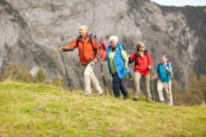 Seniors hiking in mountainous area
