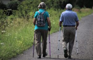 Elderly couple with hiking poles