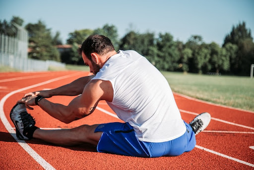 a runner stretching