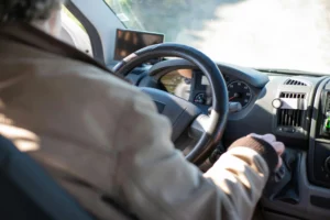 close up of older man driving