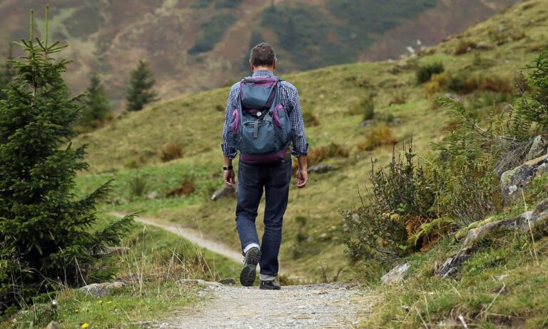 man hiking by himself outdoors