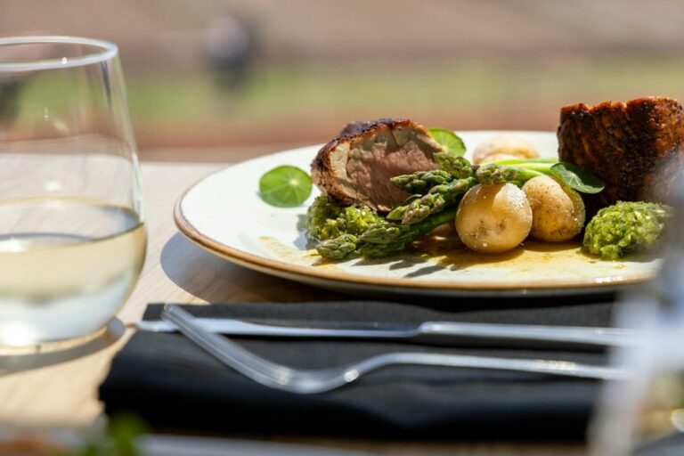 A nutritious meal with steak, potatoes and asparagus