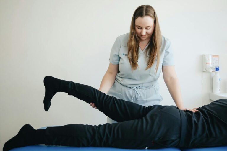 Physical Therapist Working with Patient