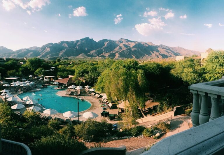 View of an Arizona resort with a pool and mountains in the background